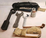 Assorted 50mm Wrenches (3) With (1) Socket. Inlcudes Bag And 2 Komatsu Brushes. Fixed Price $349.99.